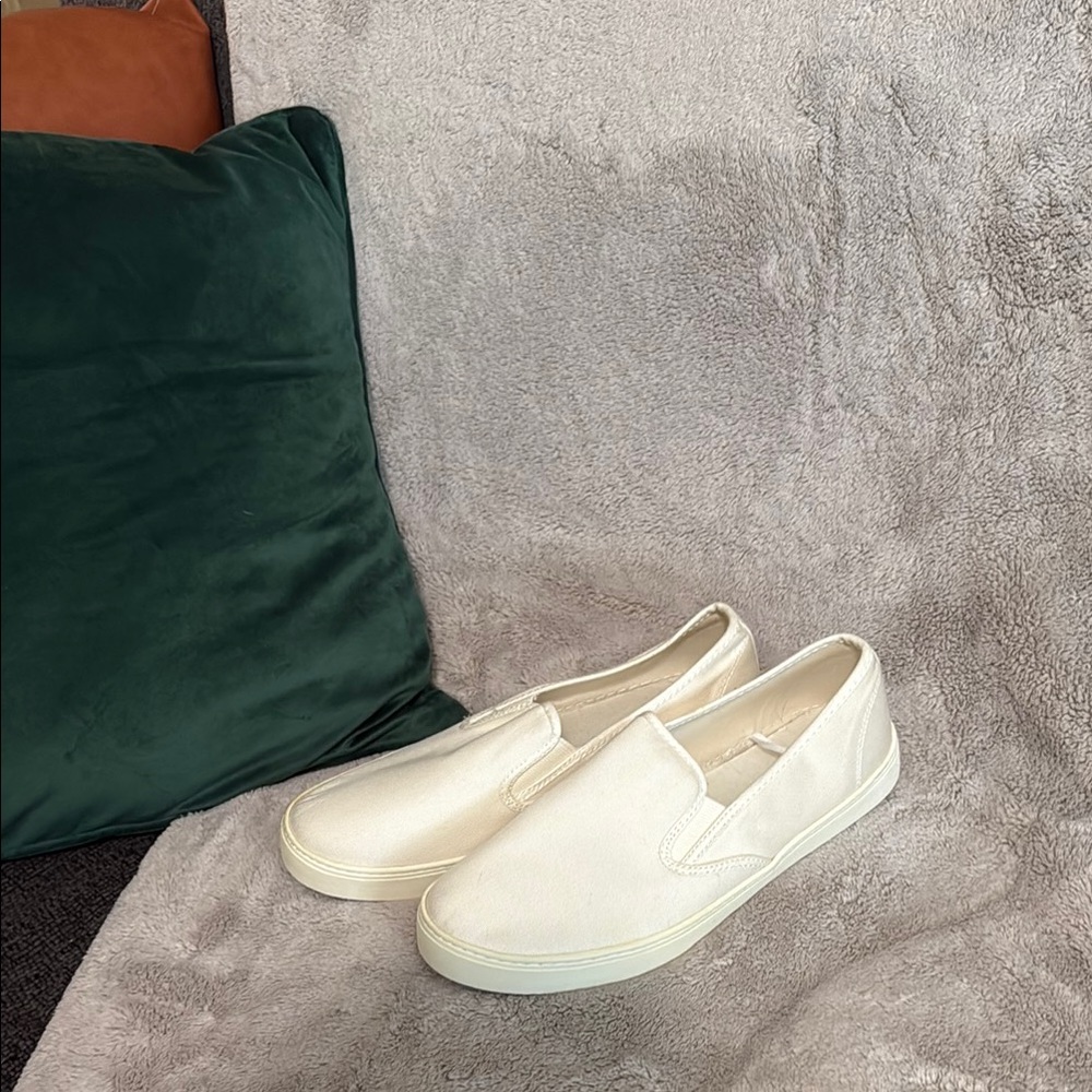 White/cream slip on canvas shoe